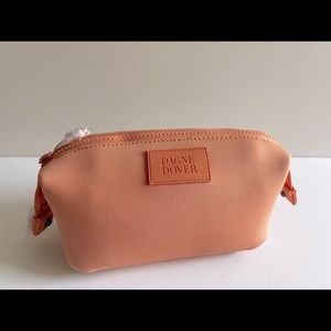 Dagne Dove Hunter Toiletry Bag in Pomelo color, size small